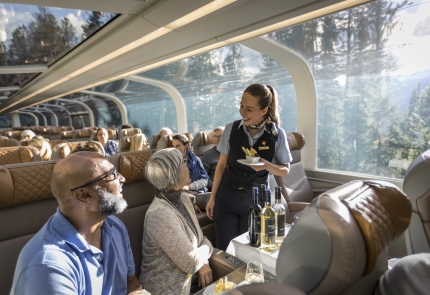 Host interacting with guests in a GoldLeaf dome