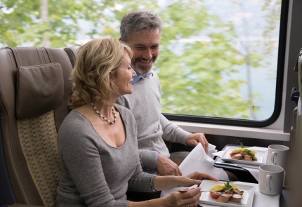 Guests enjoying food service onboard Rocky Mountaineer